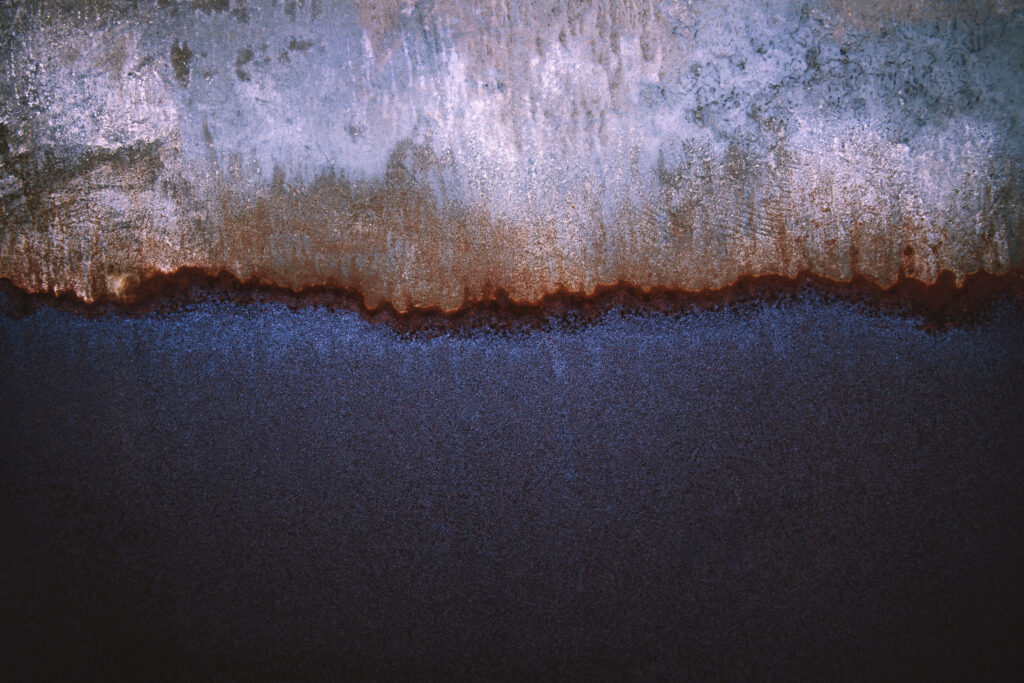 Rusted Metallic Wallpaper: Textured Earthy Tones & Corroded Patterns
