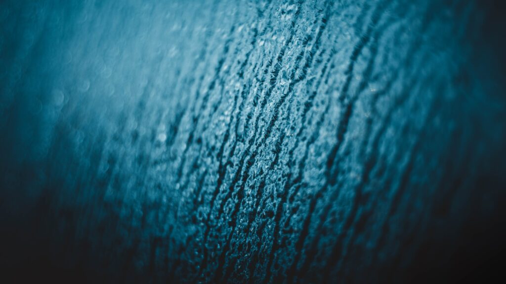 Macro Textured Wallpaper: Soft Snowflake Pattern with Blurred Background