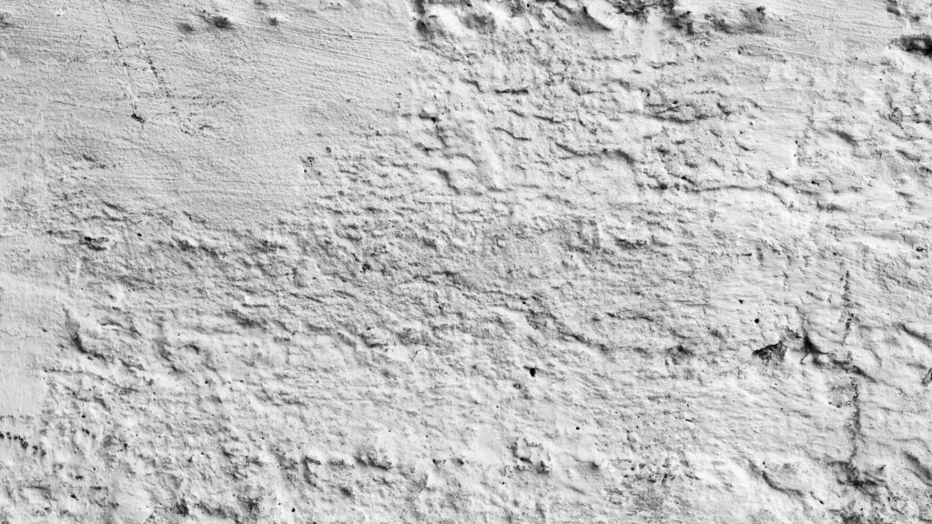 Rugged Textured Wall Close-Up: Earthy Tones Wallpaper Background