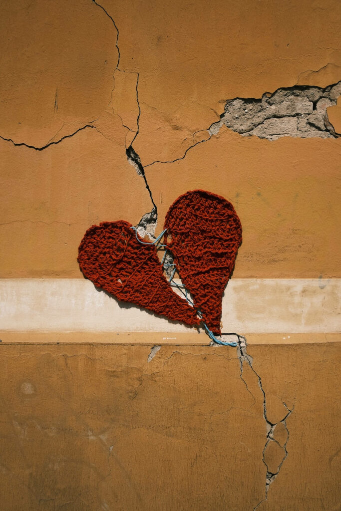 Resilient Heart: Textured Brown Wall Wallpaper Background Design