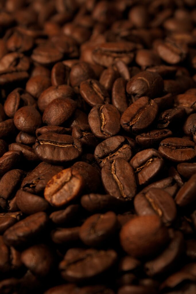 Close-Up Roasted Brown Coffee Beans Wallpaper Background