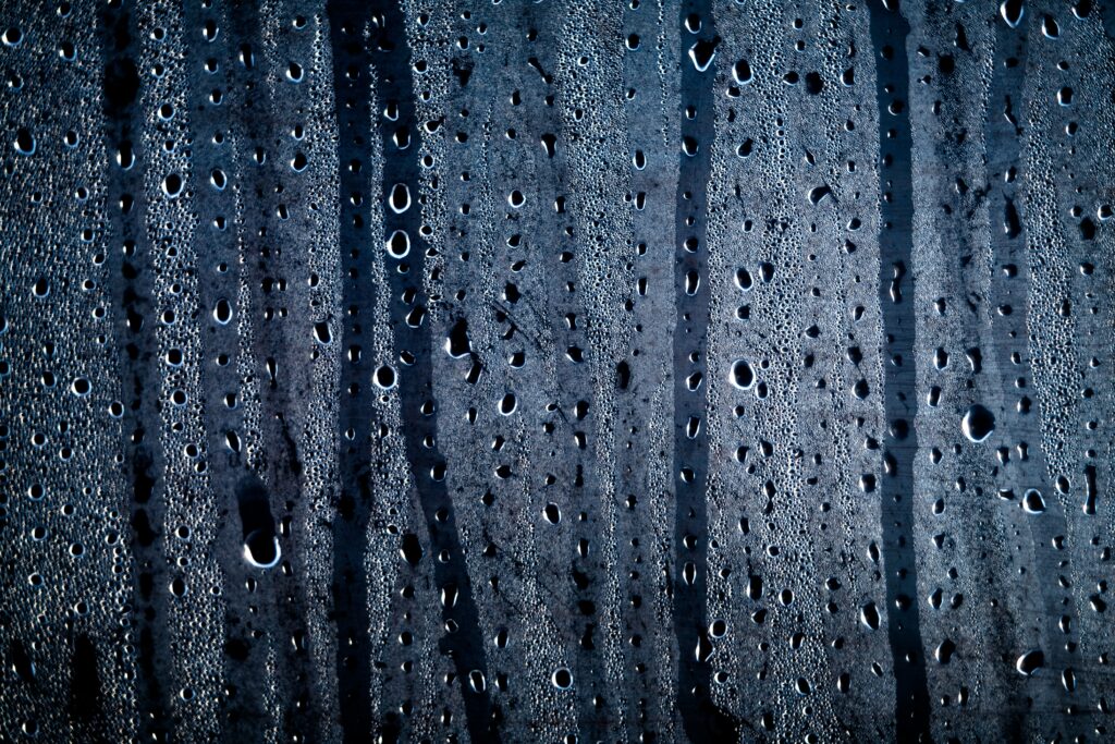 Textured Water Drops Wallpaper Background for Dramatic Visuals