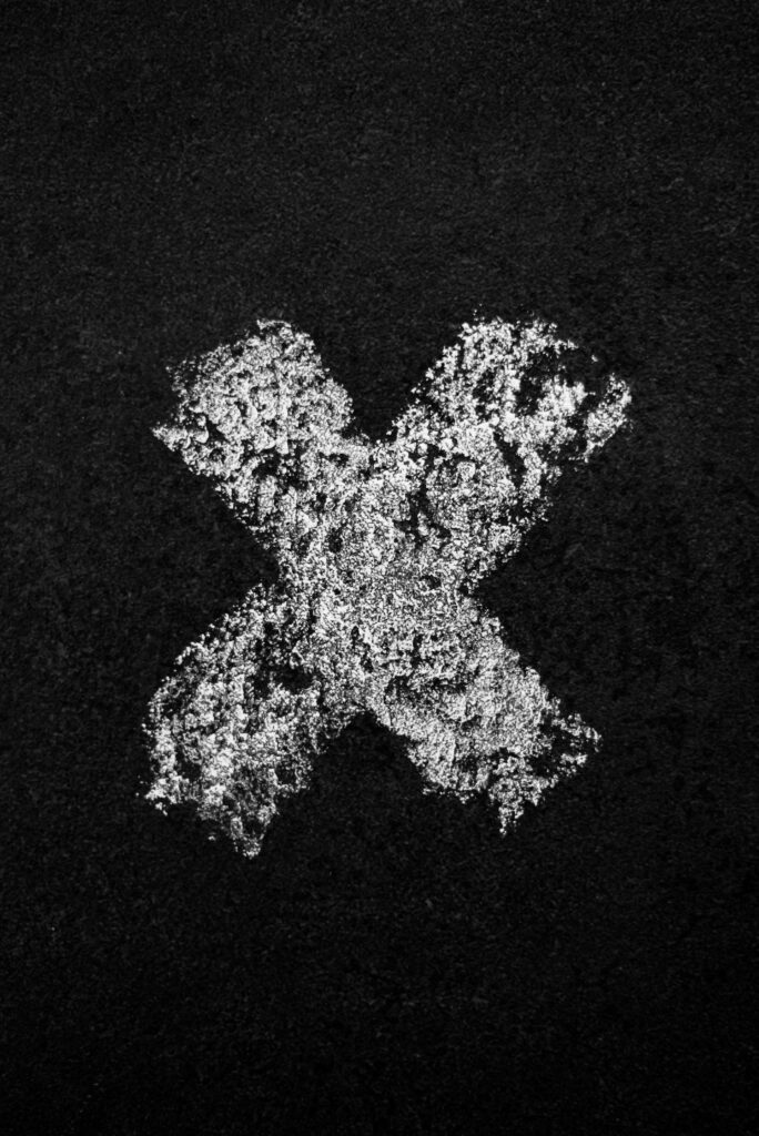 Textured White Cross on Dark Asphalt Wallpaper - Striking Contrast