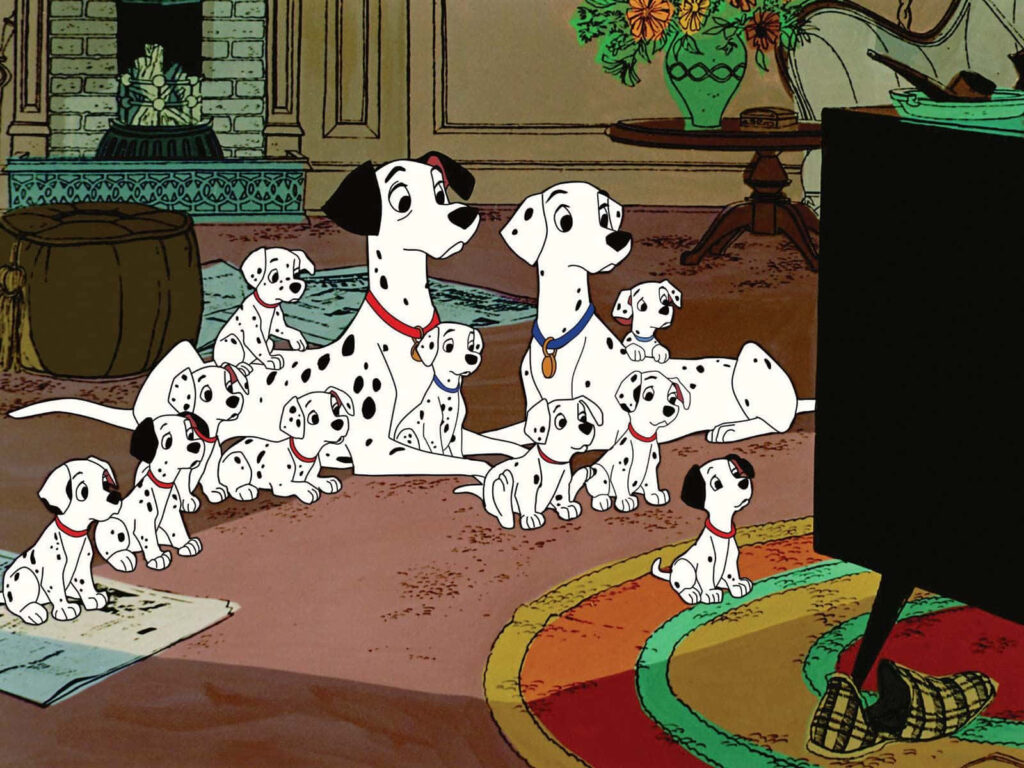 101 Dalmatians: Pongo Leading a Pack of Playful Puppies Wallpaper