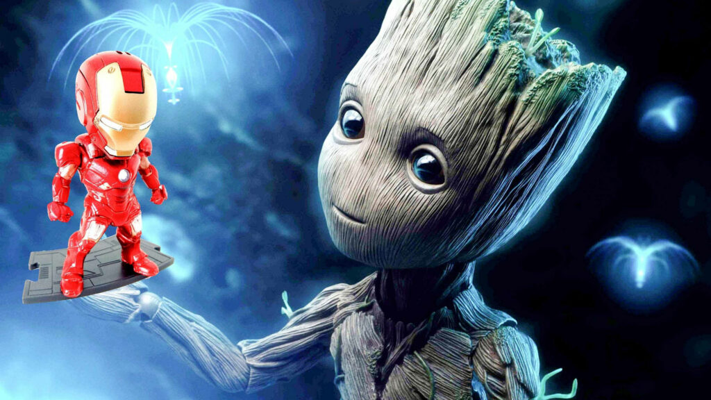 Groot's Toybox: Iron Man Figure Held By Cute Tree-Like Alien Wallpaper