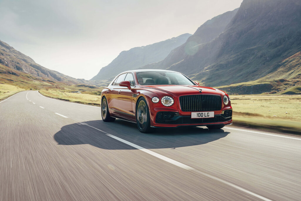 The Bentley Flying Spur Redefining Luxury and Performance amid Breathtaking Skyline Wallpaper