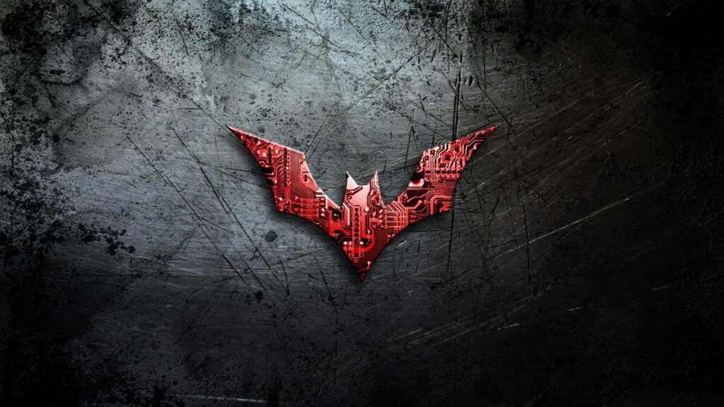 The Bold Impression: Red Batman Logo Enthralling the Mysterious Dark Gray Backdrop Wallpaper