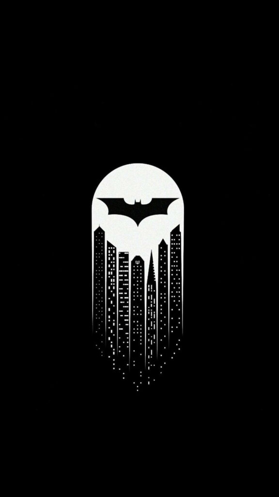 The Illuminated Icon: Best Batman Symbol Shining Amidst a Mesmerizing Dark Background Wallpaper