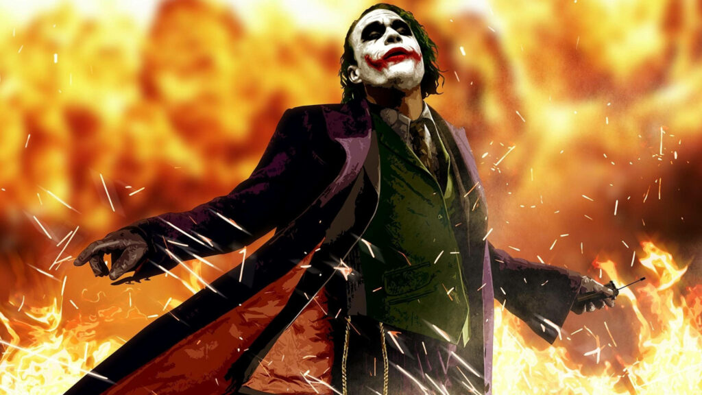 Blazing Chaos: The Dark Knight's Joker Engulfed in Flames Wallpaper