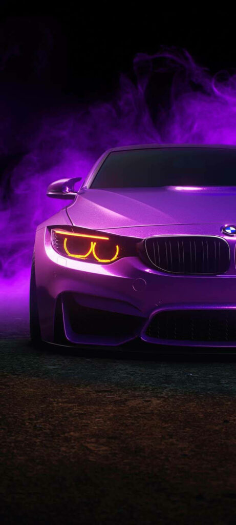 Purple Power: Captivating Front-View Portrait of a BMW M4 Surrounded by Enigmatic Purple Smoke on a Dark Iphone Car Background Wallpaper
