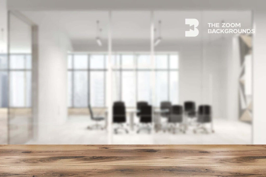 Professional virtual background with wooden desk and blurred modern office for video calls Wallpaper