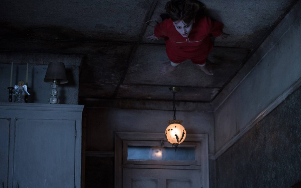 Janet Hodgson levitating in The Conjuring 2 wallpaper dark vintage room eerie pendant lamp
