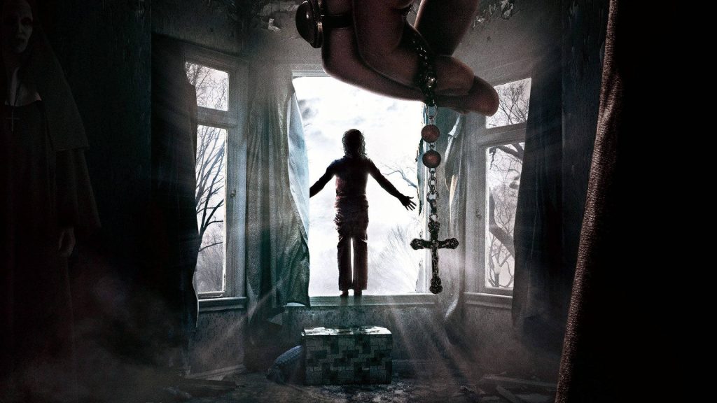 The Conjuring wallpaper with Valak silhouette rosary crucifix horror suspense background