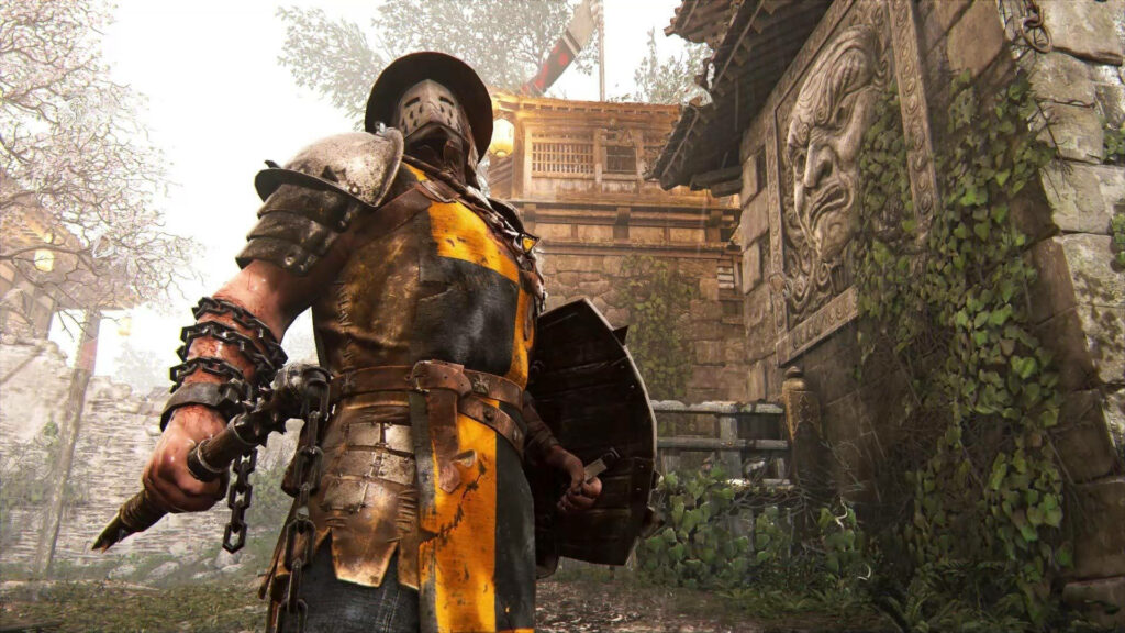 Rustic Knight in Armor Stands Before Ancient Building - For Honor Wallpaper