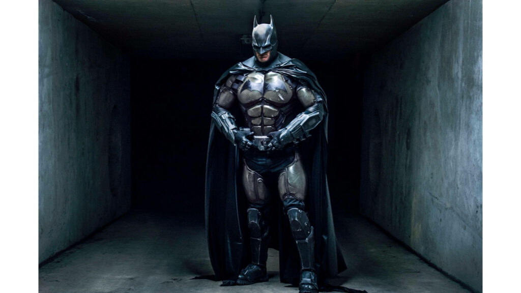 The Dark Knight Rises: Batman's Majestic Mastery in a Striking 4k Background Wallpaper