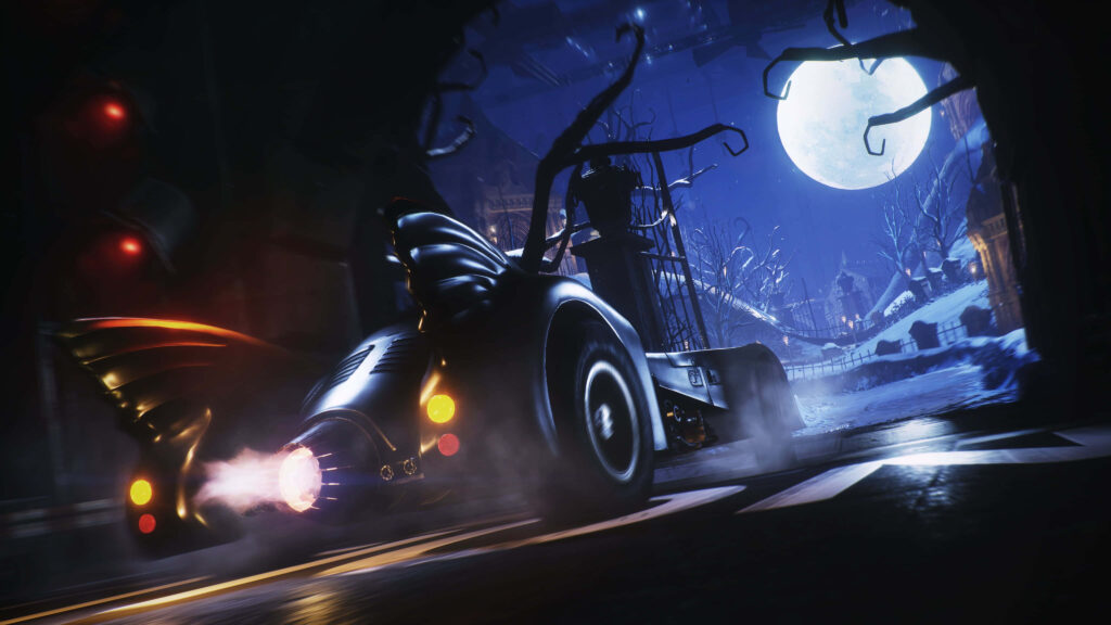 Iconic Batmobile Roars Through Gotham's Shadows in The Dark Knight Rises Wallpaper