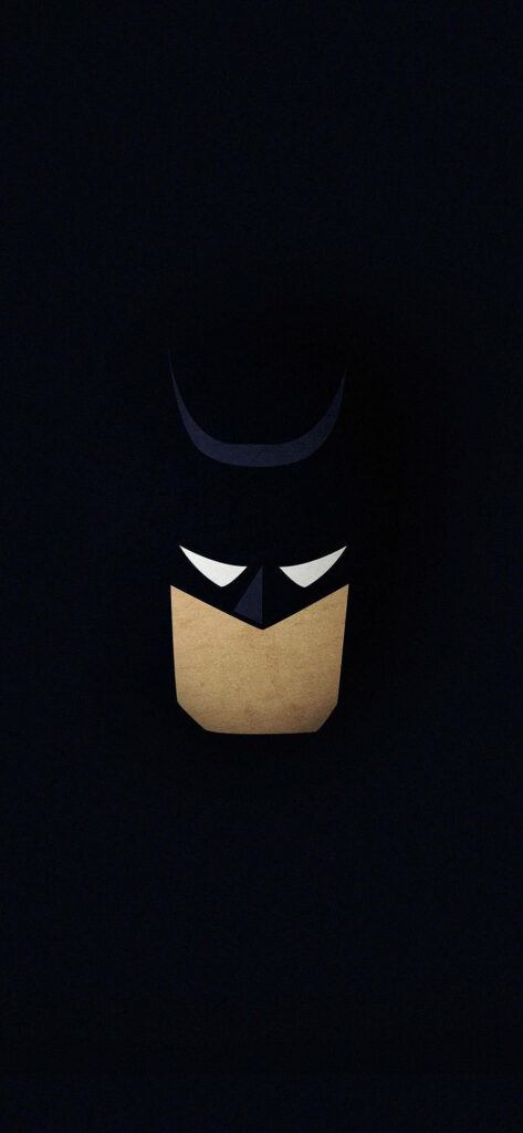 The Dark Knight's Iconic Visage: Batman's Cartoon Face Takes Center Stage on a Sleek Black iPhone Background Wallpaper