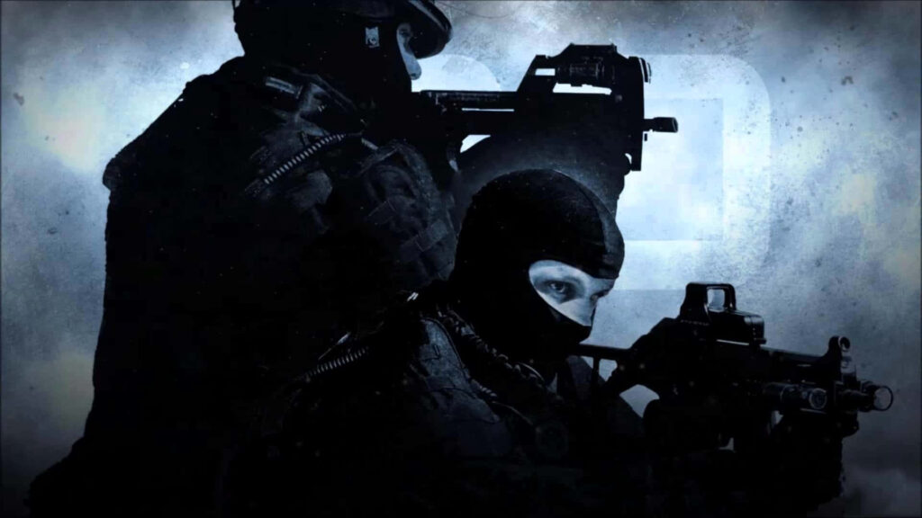 Mastering the Battlefield: A Committed CS:GO Player Ready for Ultimate Triumph Wallpaper