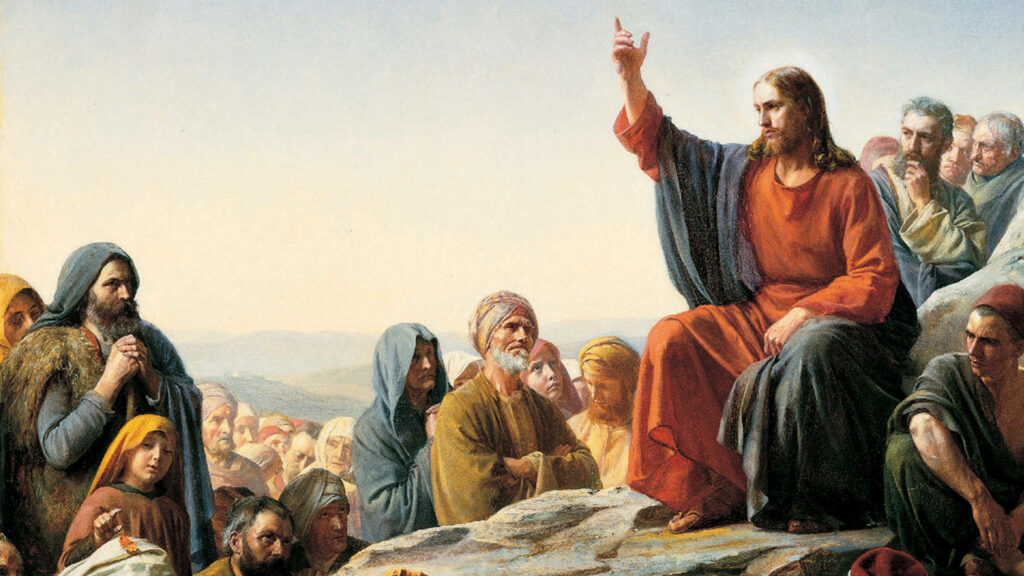 Divine Classroom: Jesus Teaching on a Rock in this Desktop Wallpaper