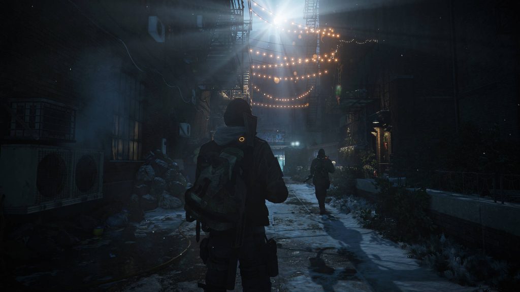 Two agents with glowing ISAC devices walk snowy urban alley in post-apocalyptic The Division wallpaper