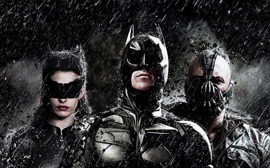 Superhero Clash: Batman, Catwoman, and Bane Unleash Chaos in The Dark Knight Rises - Captivating Batman Tablet Background Wallpaper