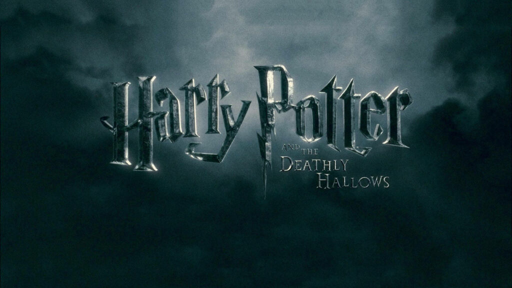 Spellbinding Laptop Background featuring 'Harry Potter and the Deathly Hallows' Movie Lettering! Wallpaper