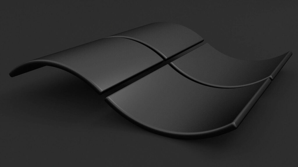 Immersive Depth: The Striking Darkness of Microsoft's 3D Logo Unveiled in a Captivating Empty Ambiance Wallpaper