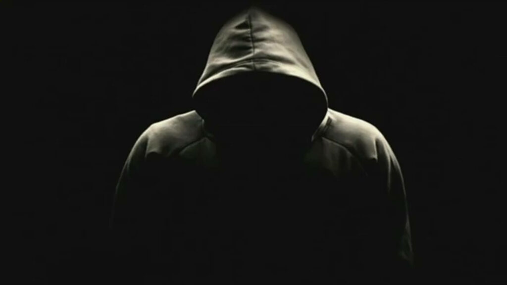 Glimpse into the Shadows: Unveiling the Enigmatic Cyber Gangster Wallpaper