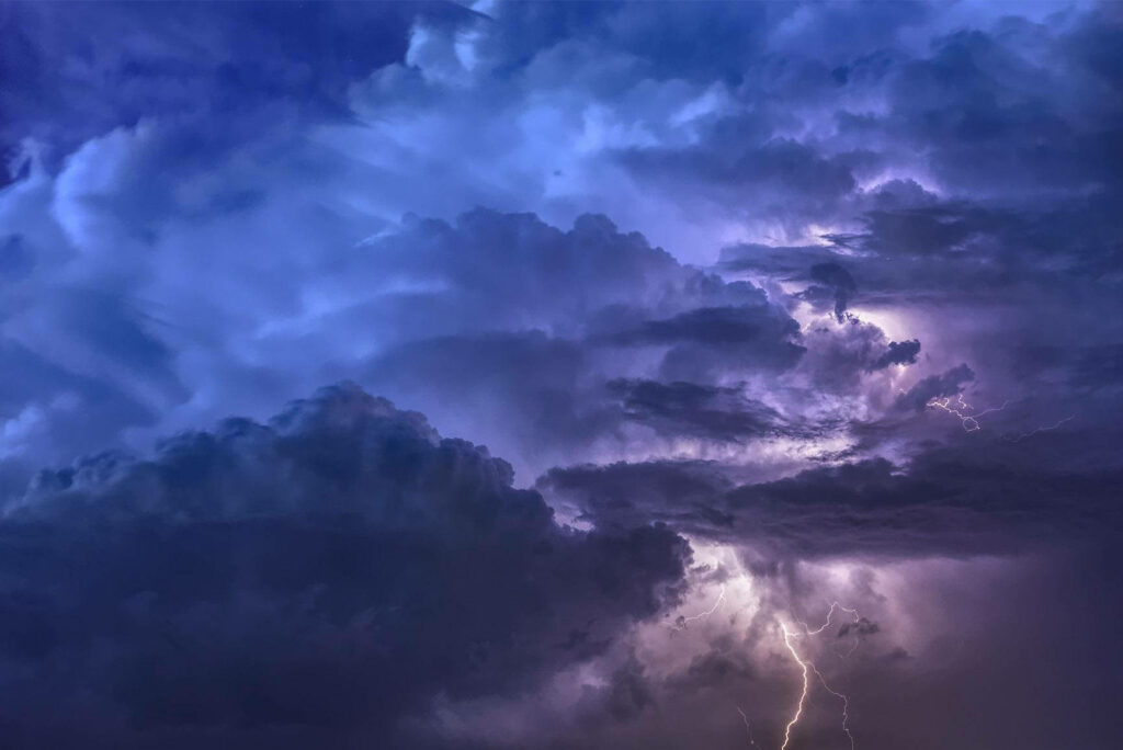 Dramatic Skies: Captivating Aesthetic Clouds with Intense Lightning in Dark Vastness Wallpaper