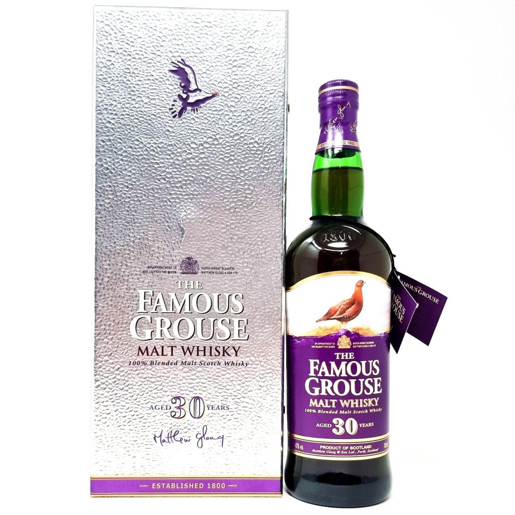 The Famous Grouse 30-Year-Old Malt Whisky bottle with metallic textured presentation box wallpaper