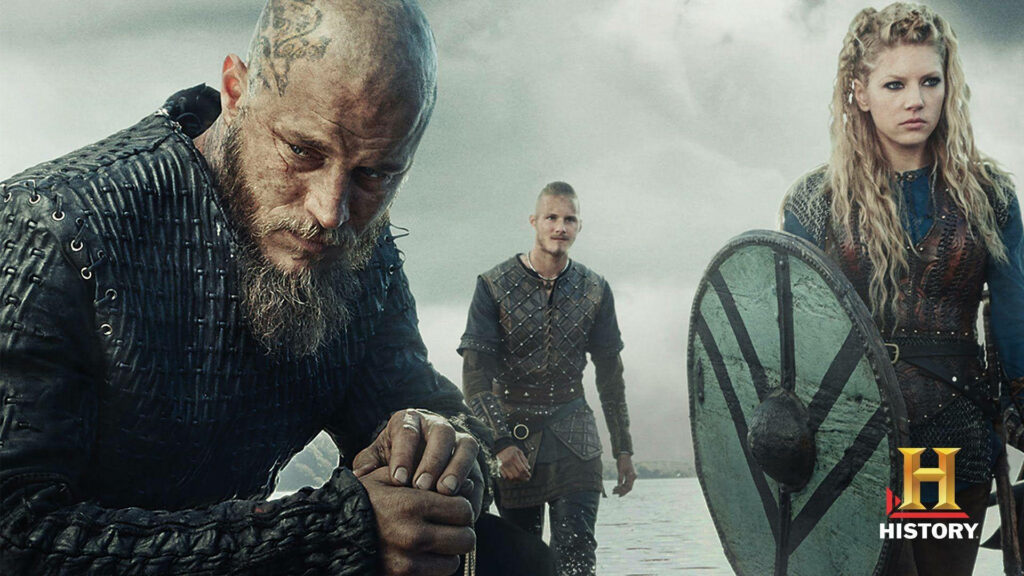 The Legendary Trio of Vikings: Ragnar, Bjorn, and Lagertha in Epic Wallpaper