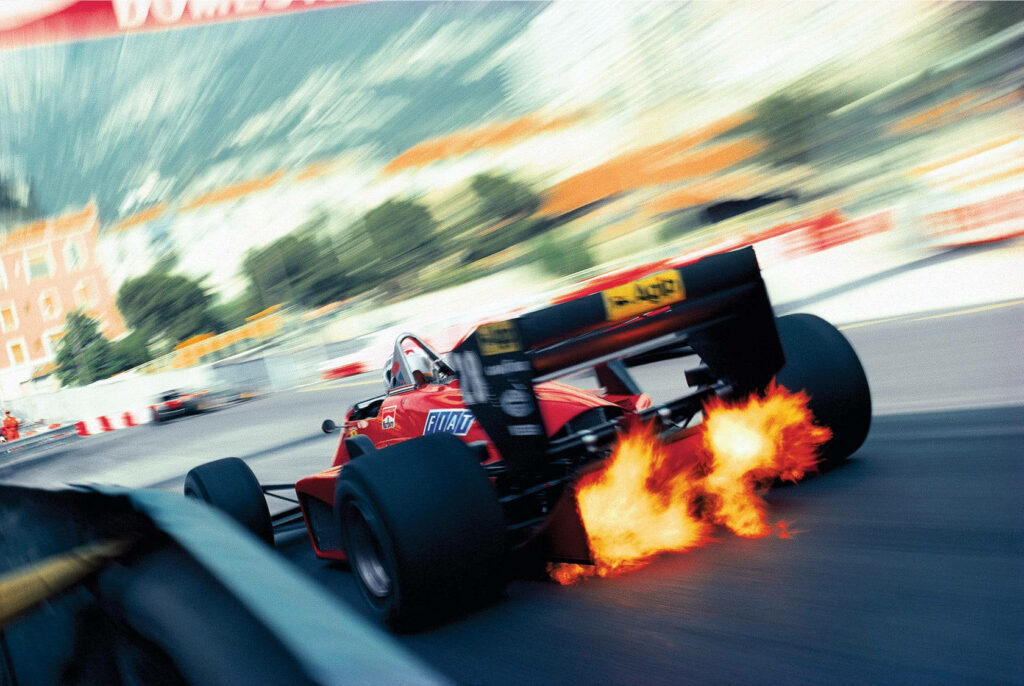 Fearless Ferrari: Merging Power and Precision at Rascasse Corner Wallpaper
