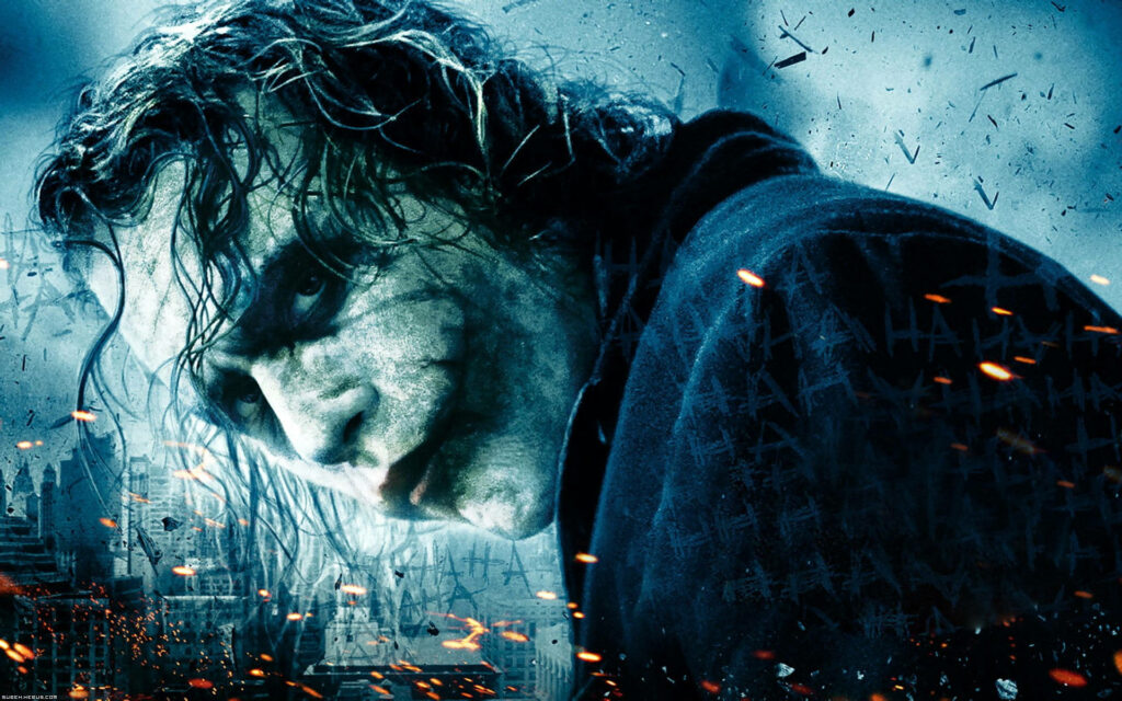 The Intense Gaze of Heath Ledger's Joker: A Captivating Close-up Portrait Wallpaper