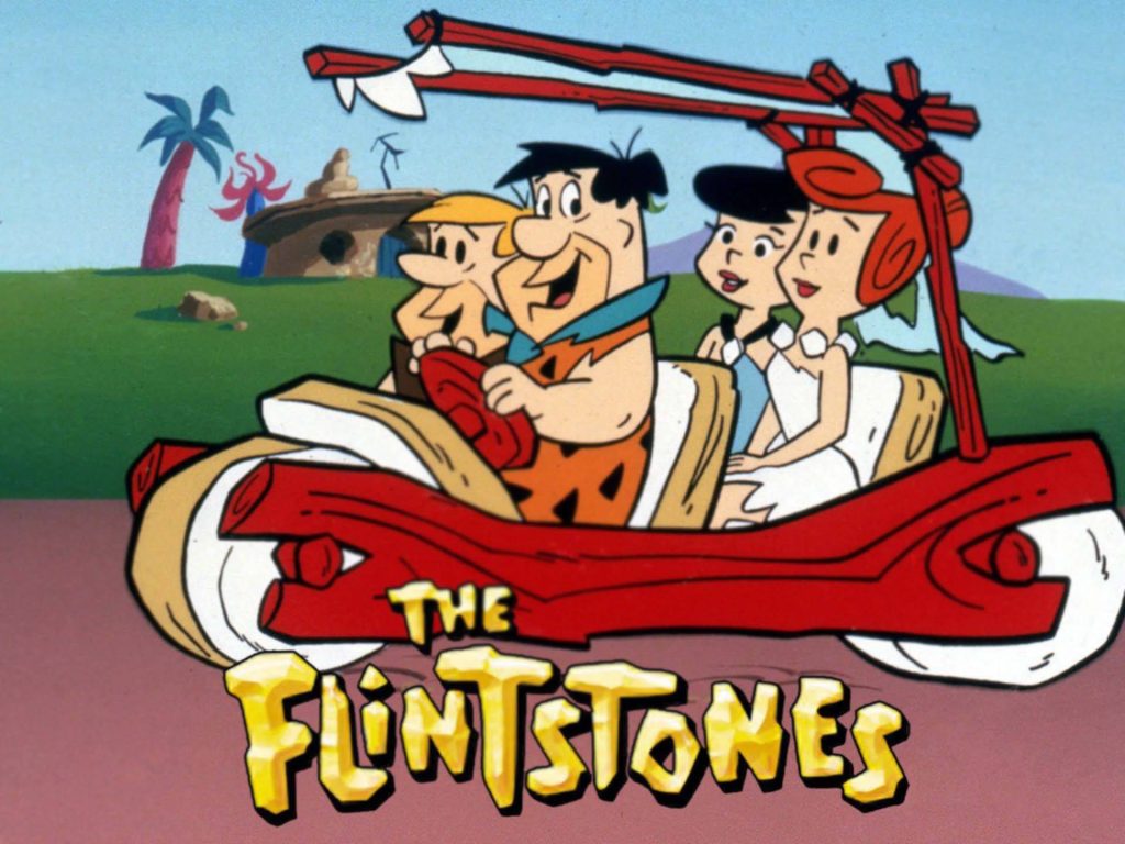 The Flintstones wallpaper with Fred Wilma Barney Betty in iconic foot-powered car retro cartoon