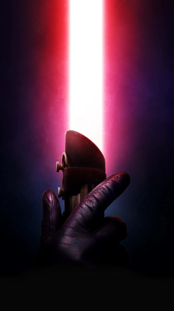 The Force Awakens: Gripping the Red Lightsaber in Star Wars Crimson Enchantment Wallpaper