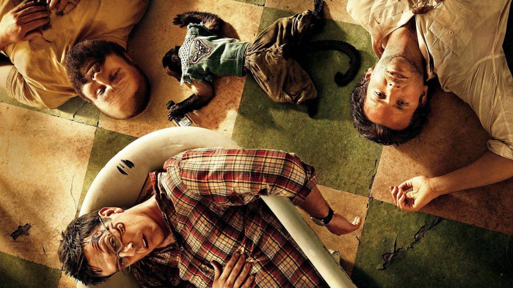 High-angle The Hangover Part II poster with Bradley Cooper Ed Helms Zach Galifianakis and monkey Wallpaper