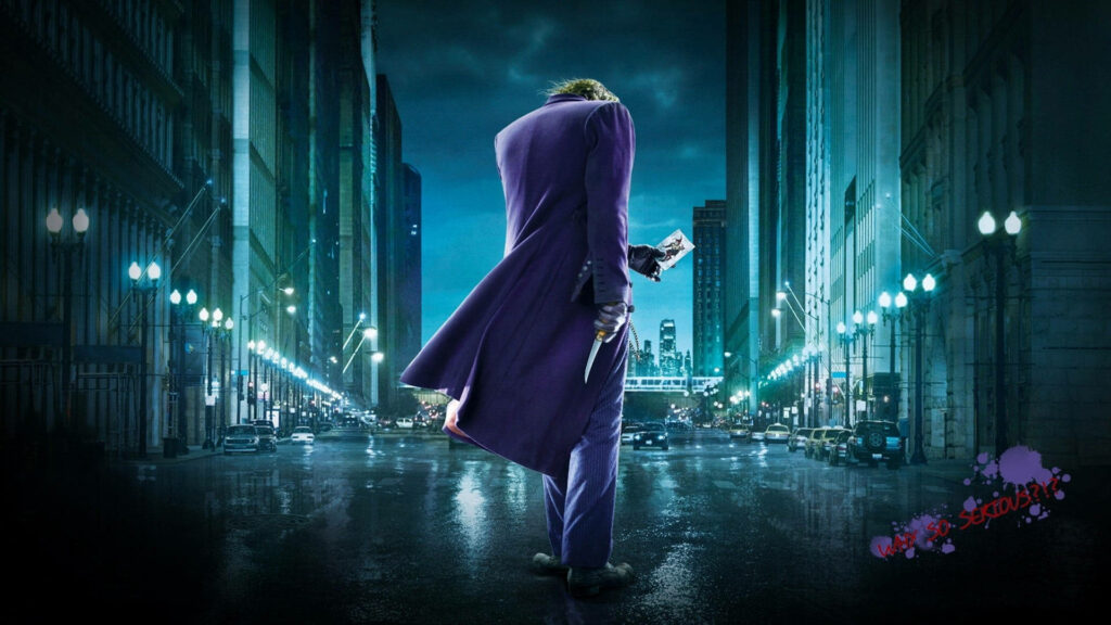 Haunting Night Stroll: Heath Ledger's Iconic Joker Roams Gotham City Wallpaper