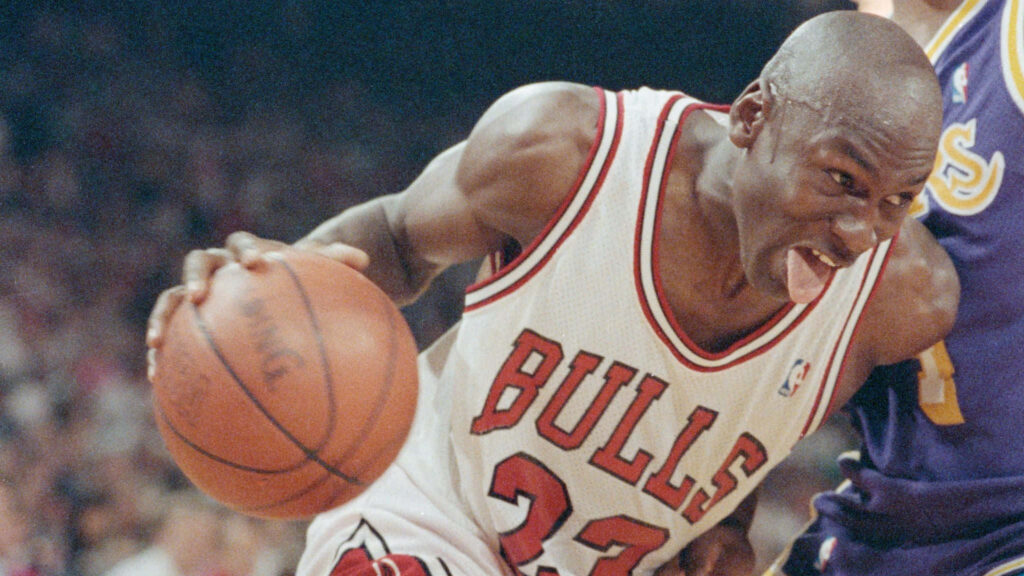 Monochrome Intensity: Michael Jordan, The Iconic Basketball Legend Wallpaper
