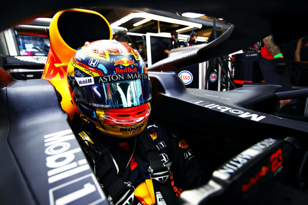 The Intensity of Speed: Sergio Perez Ready for the Race in His F1 Cockpit Wallpaper