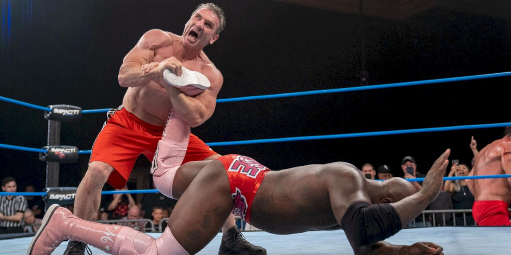 Ken Shamrock Dominates Moose with Twisted Leg: Wallpaper Edition