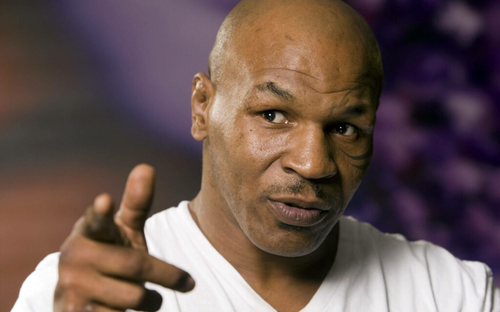 Intense Eye Contact: Mike Tyson's Unfiltered Charisma Captured in 4K Wallpaper