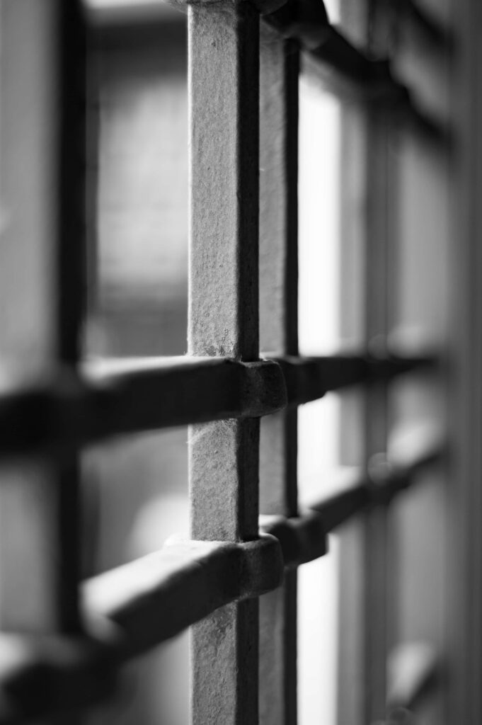 Locked-In: A Zoomed-In View of Prison Bars as Wallpaper