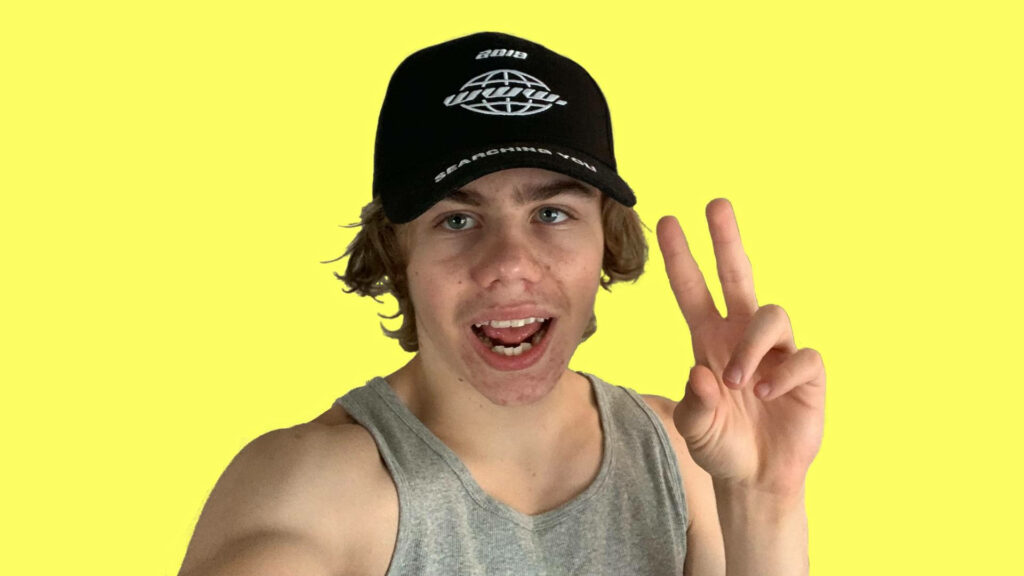 The Kid LAROI Peace Sign Wallpaper - Bright Yellow Background