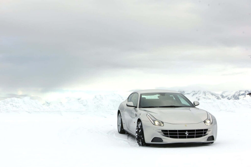 Capturing the Essence of Italian Sports Car Excellence: A Breathtaking High-Resolution Shot of the Luxurious and Powerful Ferrari FF in Stunning Red Wallpaper