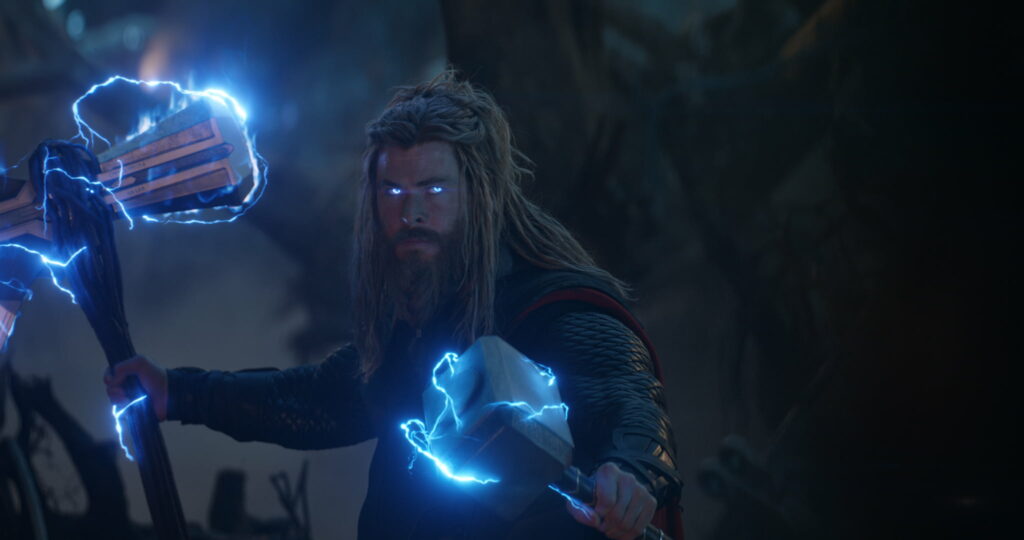The God of Thunder: Unleashing Dual Power Wallpaper