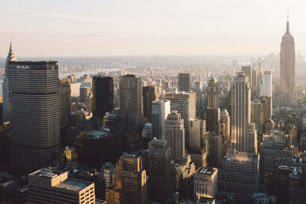 Seaside Skyscrapers: A Stunning Morning City Wallpaper