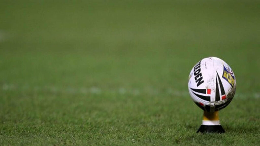 Powerful NRL Symbol: A Motivating Shot of a Soccer Ball Gracing the NRL Arena Wallpaper
