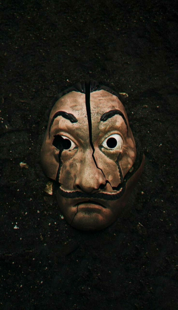 The Sinister Enigma: Intruding Shadows of the Money Heist Mask Wallpaper