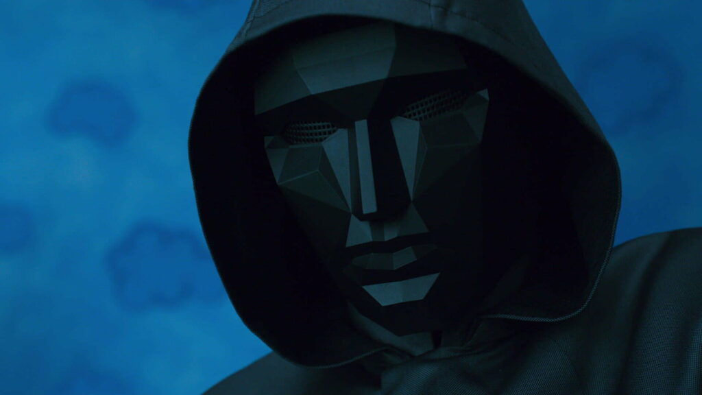 Sinister Figure in Squid Game: Masked Intrigue Within the Deadly Game Wallpaper