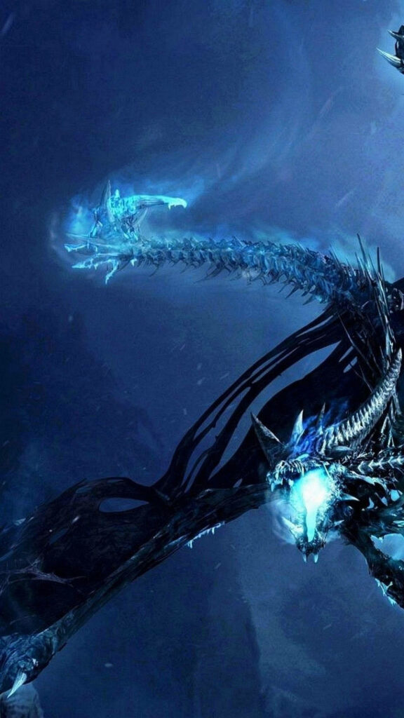 Spectral ice dragon with glowing blue flames dark skeletal details fantasy wallpaper background